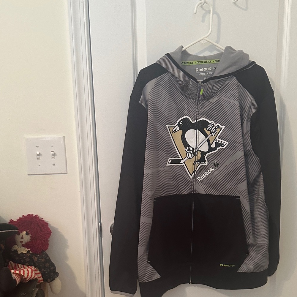 Reebok Men’s Pittsburgh Penguins zip up.